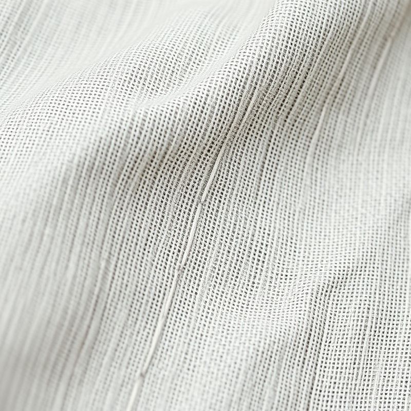 pollinations-bamboo-wrap-top-3-153166 Close-up detail of the soft bamboo wrap top and flare leggings fabric texture and stitching.