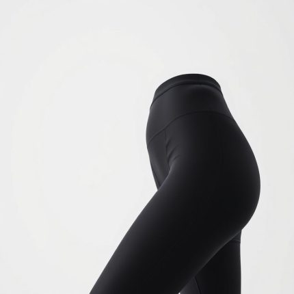 Black seamless leggings ultra high waisted leggings in black, studio shot on white background, hyperrealistic 8k image.