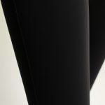 Close-up of black wide leg yoga pants scrunch bum flare leggings, showcasing Egyptian Cotton fabric texture and stitching detail.