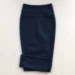 Navy Blue high waisted black yoga pants from Australia, folded flat lay.