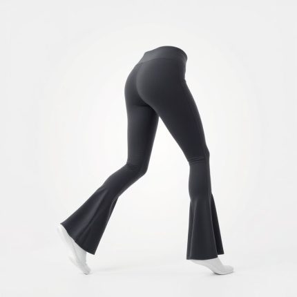 Flare active pants in charcoal grey, hyperrealistic studio photo on white background.