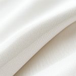 Close-up of linen fabric texture and stitching on flare gym leggings | active flare leggings, highlighting quality and detail.