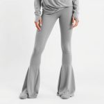 A Heather Grey flare leggibgs and yoga wrap top on a white background.