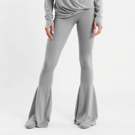 A Heather Grey flare leggibgs and yoga wrap top on a white background.