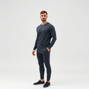 Male yoga outfit in charcoal, mens yoga wear on white background, hyperrealistic studio photo.