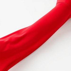 Red wide leg yoga pants Australia, flare leggings for short legs on white background, hyperrealistic studio photo.