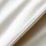 Close-up detail of the soft organic cotton fabric and stitching on the wrap top australia sweatshirt.