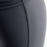 Close-up of moisture-wicking performance fabric in yoga pants womens seamless shorts, highlighting texture and stitching.