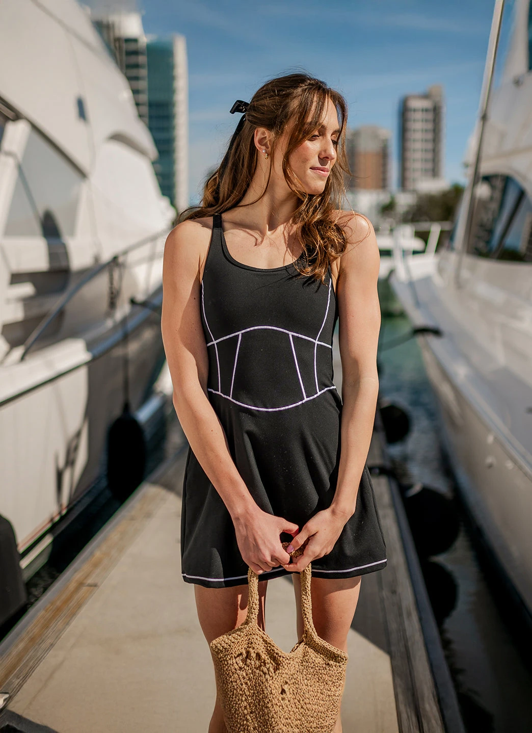 model wearing gym flare pants demonstrating correct length and waistband fit